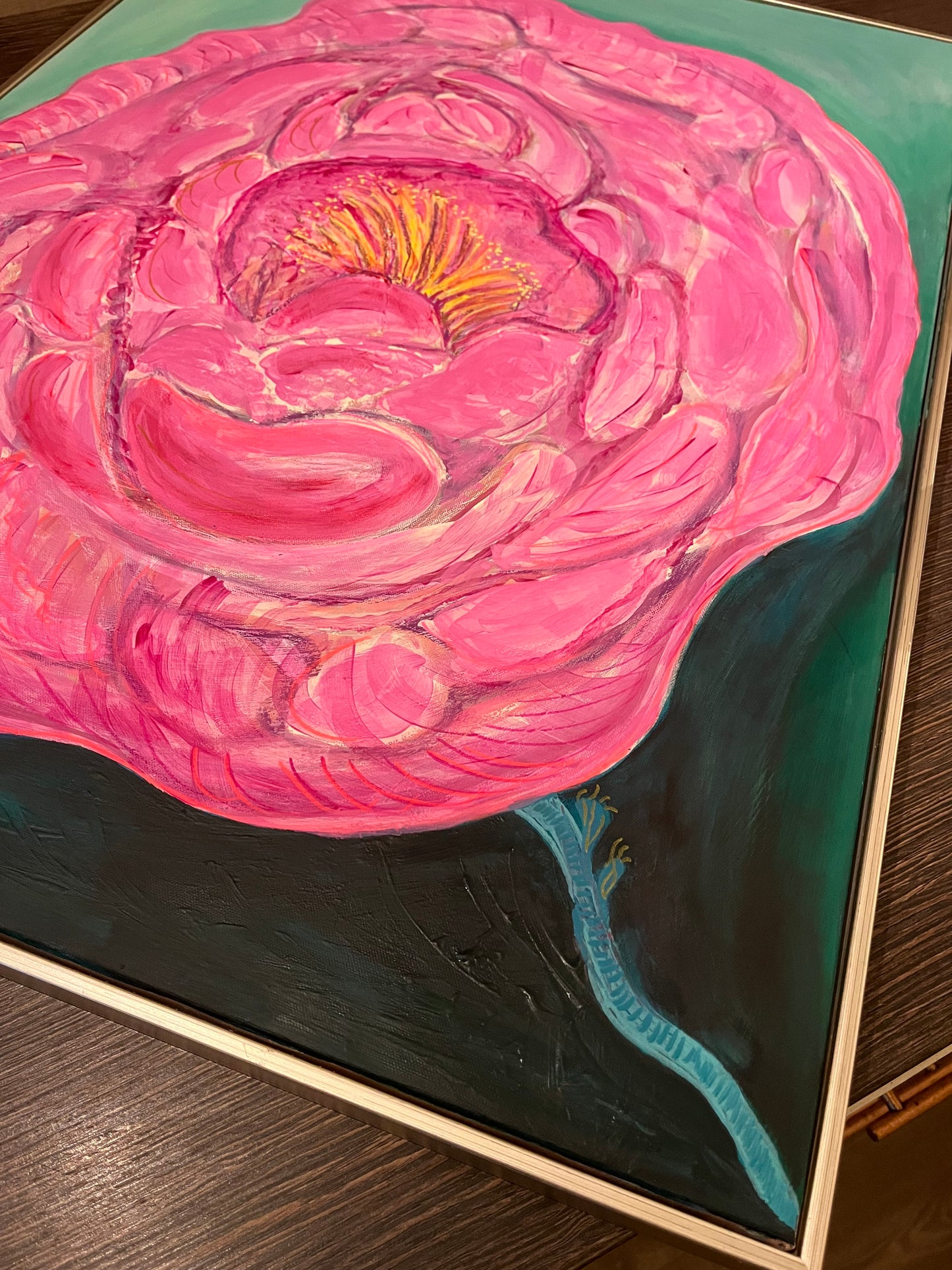 In Bloom ,floral pinks,green background.